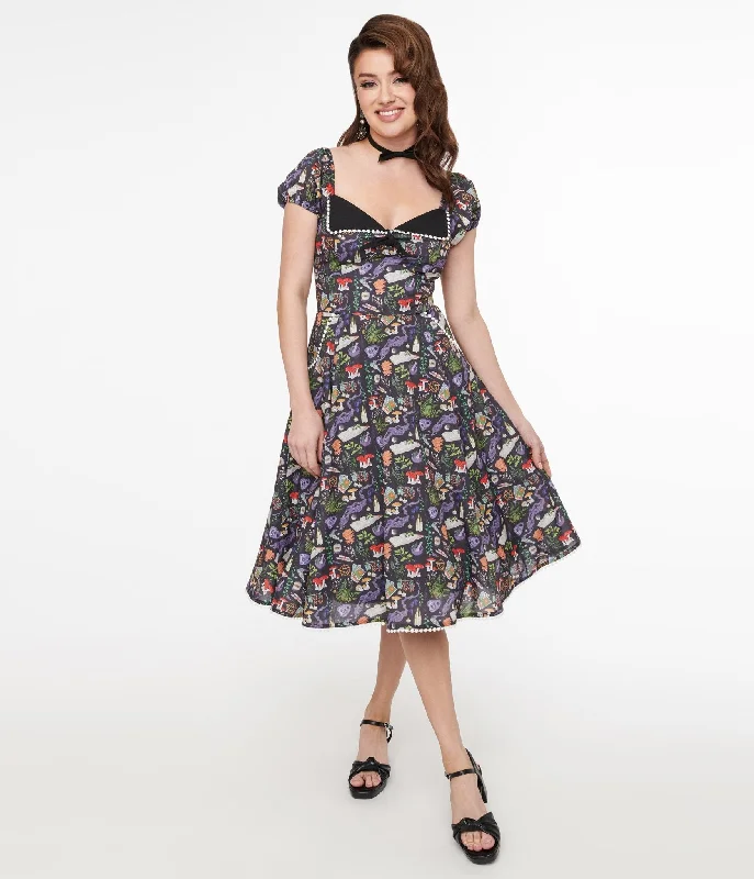 Unique Vintage 1950s Black Spellbinding Print Swing Dress